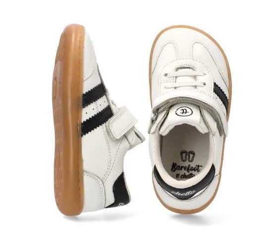Zapatillas blancas niño Chetto de piel con bandas negras